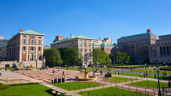 Large university courtyard with students walking