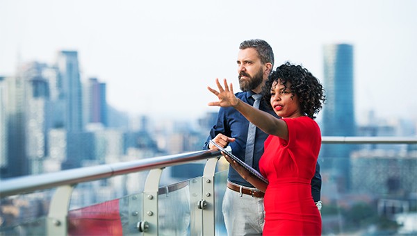 Property manager on city balcony