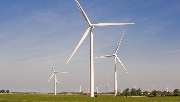 Wind turbines with blue sky in the background