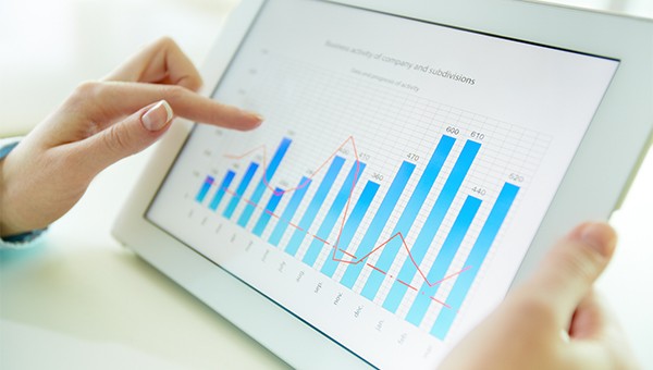 Close up of a tablet screen showing a bar graph